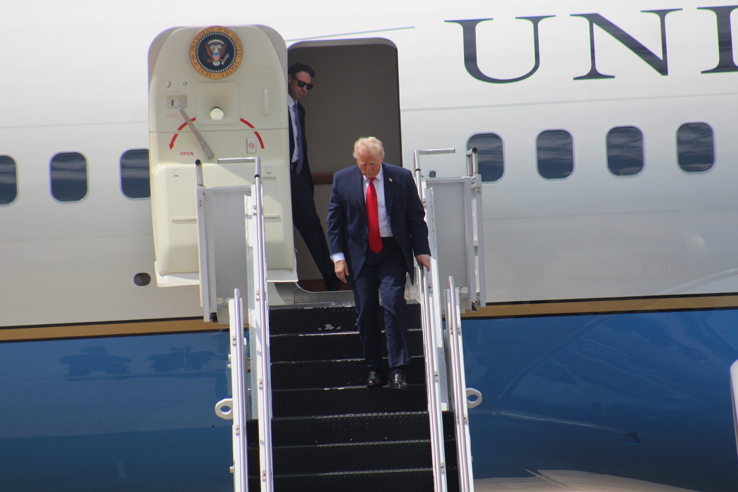 Trump seeks to rally GOP with area farm visit; Dems answer with
